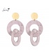 Roze oorbellen met lichte dubbele ringen