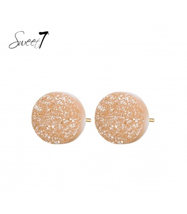 Creme oorknopje met glinstering