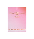 Goudkleurige armband met geboortejaar 1985 en verjaardagskaart