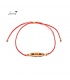 Rode elastische armband met goudkleurig detail met kleine kraaltjes