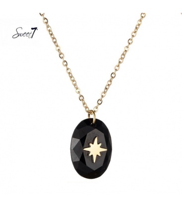 Goudkleurige ketting met zwarte steen met een ster