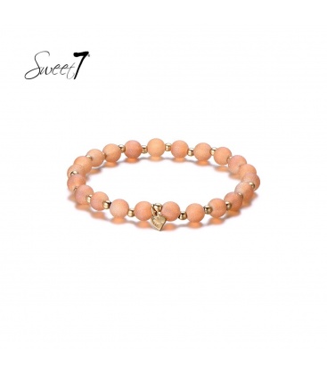 Elastische armband met ronde bruine kralen en kleine kraaltjes 