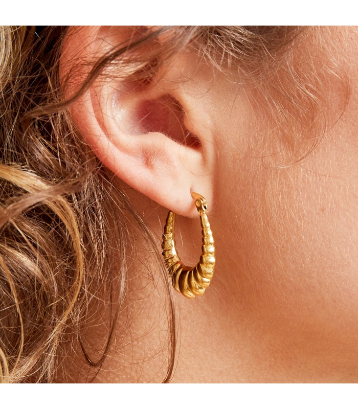 Goudkleurige ronde oorbellen antiek design