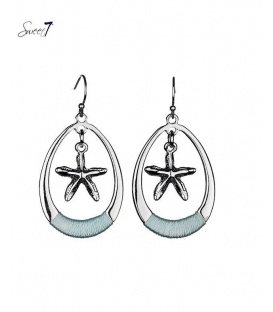 Mooie ovale zilverkleurige oorbellen met hanger in de vorm van een zeester