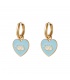 Goudkleurige oorringen met een blauwe hanger in hartvorm met oog