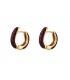 Goudkleurige ronde oorbellen versierd met donkerpaarse zirkoonsteentjes