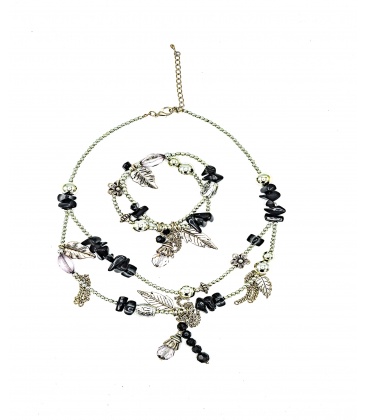 Zilverkleurige halsketting met bedels en bijpassende armband