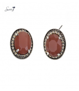 Roze ovale oorbellen met een witte rand rondom