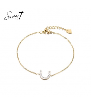 Goudkleurige armband met hoefijzer van zirkoonsteentjes