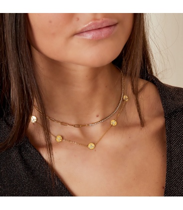 Goudkleurige halsketting met rondjes en steentjes
