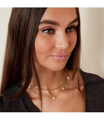 Goudkleurige halsketting met rondjes en steentjes