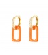 Goudkleurige oorhangers met zirkonia steentjes en een oranje hanger