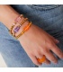 Goudkleurige kralen armband met oranje gummy bear
