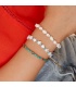 Armband met blauwe kralen en witte sterretjes