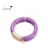 Paarse armband met goudkleurige elementen
