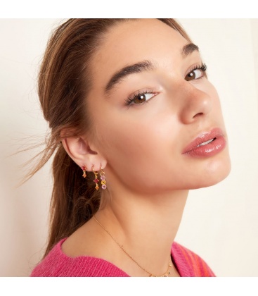 Zilverkleurige oorbellen met drie rondjes van steentjes