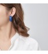 Blauwe oorclips met streep motief