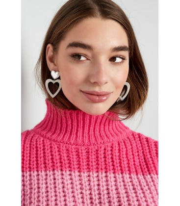 Goudkleurige oorhangers met 2 harten 