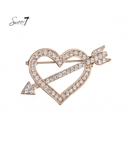 Goudkleurige hartvormige broche met heldere strass steentjes