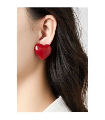 Fuchsia roze oorclips in hart vorm