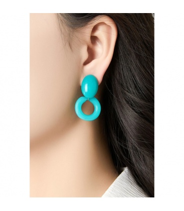 Blauwe oorclips met een ring motief