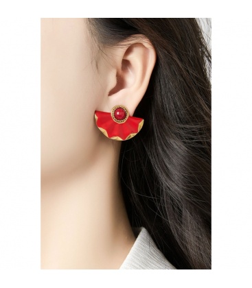 Blauwe oorclips met een waaier motief