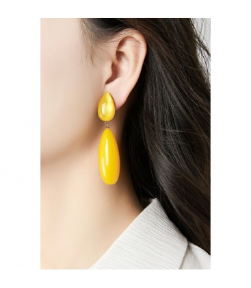 Turquoise oorclips van hars