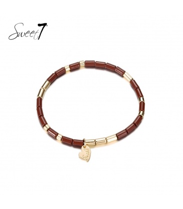 Terracotta armband met goudkleurige elementen