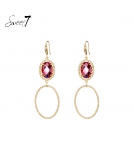 Goudkleurige oorhangers met een ovaal open design en een roze glas steentje