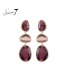 Paarse oorhangers met cat eye stenen en goudkleurige omlijsting