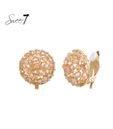 Oorclips met lichte facetsteentjes in goudkleur