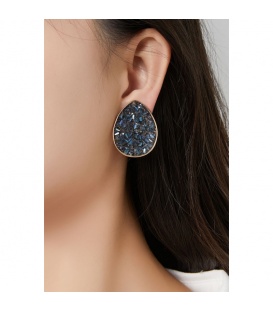 Oorclips blauwe glas steentjes en een goudkleurige omlijsting