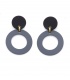 Oorclips met zwarte knop en grijze cirkel