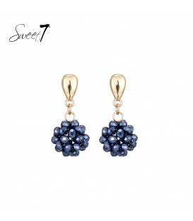 Blauwe oorhangers met een goudkleurig element