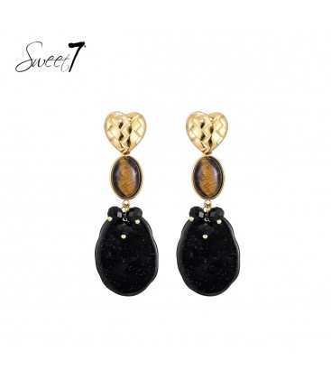 Oorbellen zwart met cat eye steen en goudkleurig hart