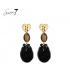 Oorbellen zwart met cat eye steen en goudkleurig hart