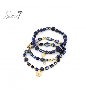 Armband met goudkleurige bedels en fonkelende blauwe kralen