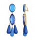 Oorclips met blauwe facetsteen en hangertjes