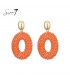 Oorbellen oranje met glas kralen en een goudkleurig oor stukje