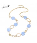 Mooi blauwe schakelketting met goudkleurige elementen