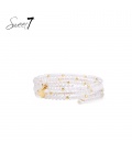 Armband met witte kraaltjes en goudkleurige details