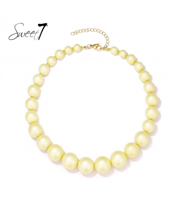 Halsketting met gele kralen en goudkleurige sluiting