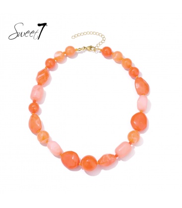 Halsketting oranje met onregelmatige kralen in warme tinten