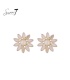 Oorbellen beige in bloemvorm met facetsteentjes