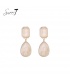 Oorbellen met elegante druppelvorm in zachte beige tint