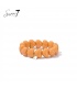Armband met oranje hart kralen en goudkleurige detail