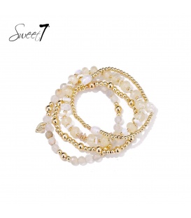 Armband met beige natuursteen kralen en goudkleurige kralen