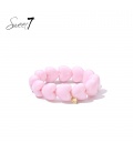 Armband met roze hartvormige kralen 