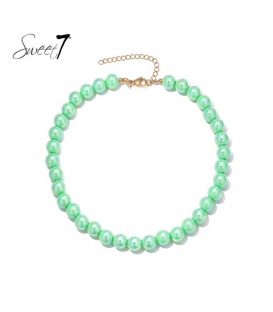 Halsketting met ronde groene kralen en goudkleurige sluiting