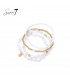 Armband met wit en goudkleurige kralen en meerdere lagen